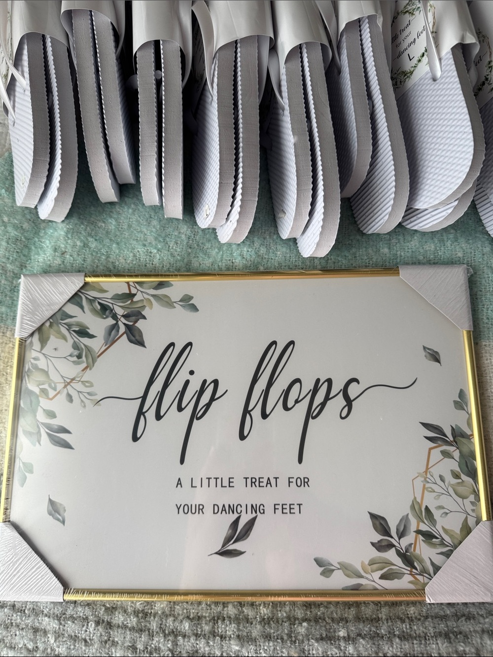 White Wedding Guest Flip Flops (35 pair) with 2 signs.